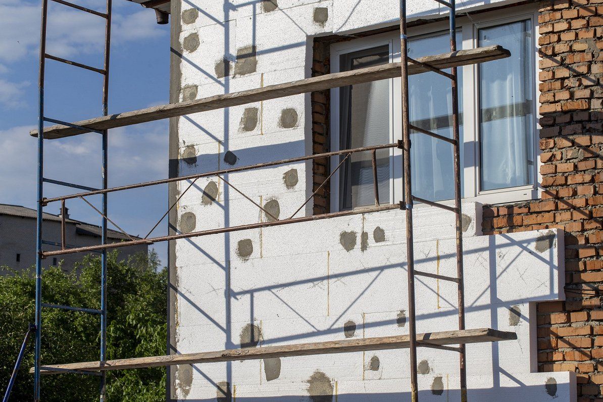 Утеплення фасадів квартир-фото